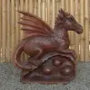 Product image 5 of the product “Dragon with leg lifted on the right made from suar wood, about 50cm Height ”